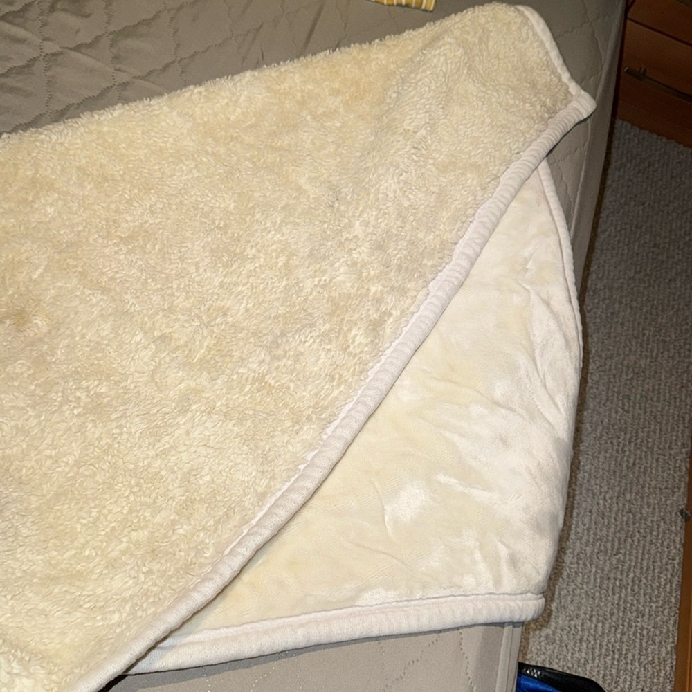 Personal-size faux fur fleece blanket, thick and soft.